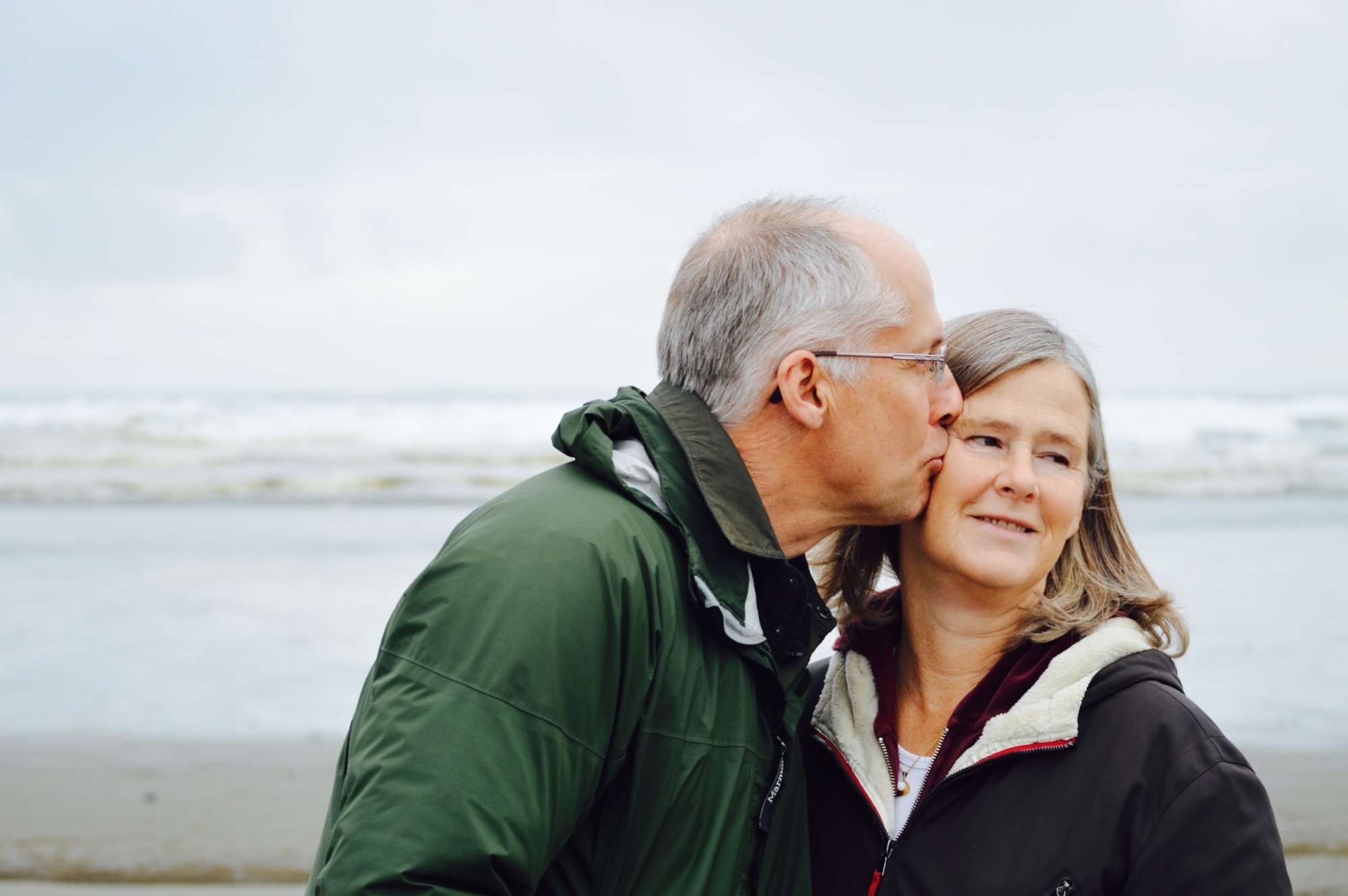 An older couple spending time together by the ocean