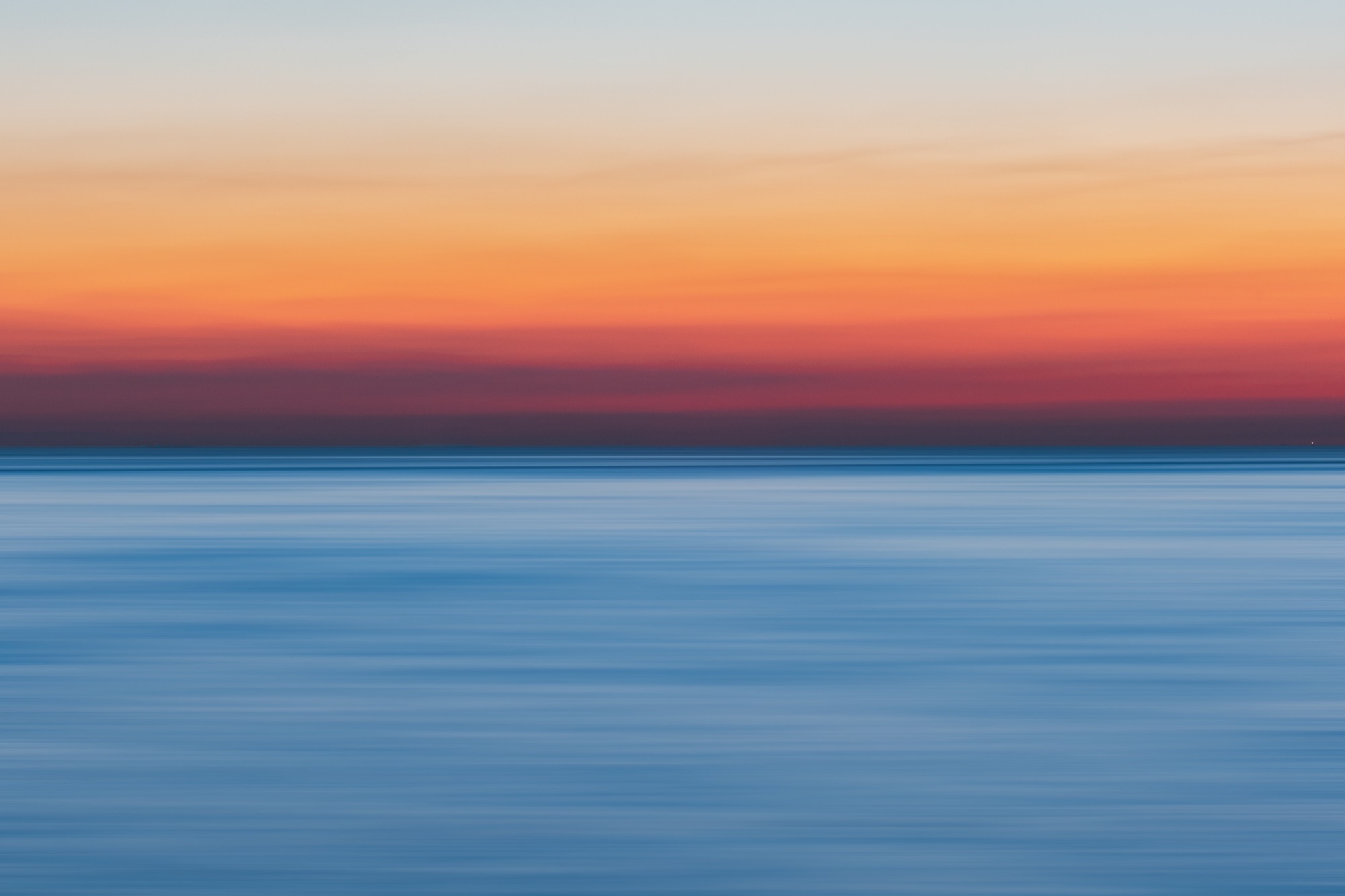 Calm ocean at sunset